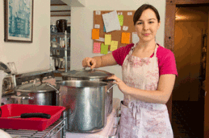 One of the Pennington Farms girls making jam