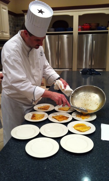 Plating the crepes.