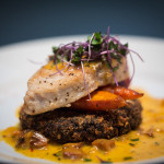 sturgeon on lentil cake