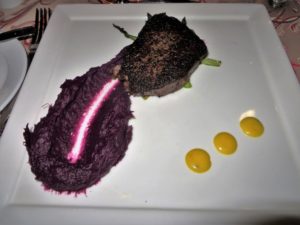A 5 Wagyu filet with asparagus and purple sweet potato puree.