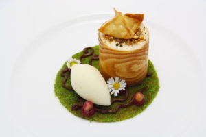 Foam of russet apples in a pastry ring with raisin and walnut cream and apple and calvados sherbert