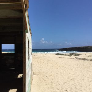 Abandoned hut on quiet beach