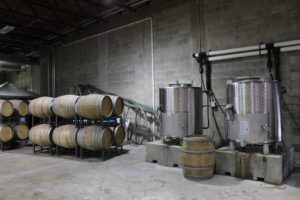 The oak barrels used for aging the wine at Quantum Leap.